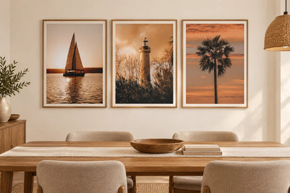 Sunset prints in a light dining room.