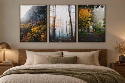 Castle and forest prints above a bed.