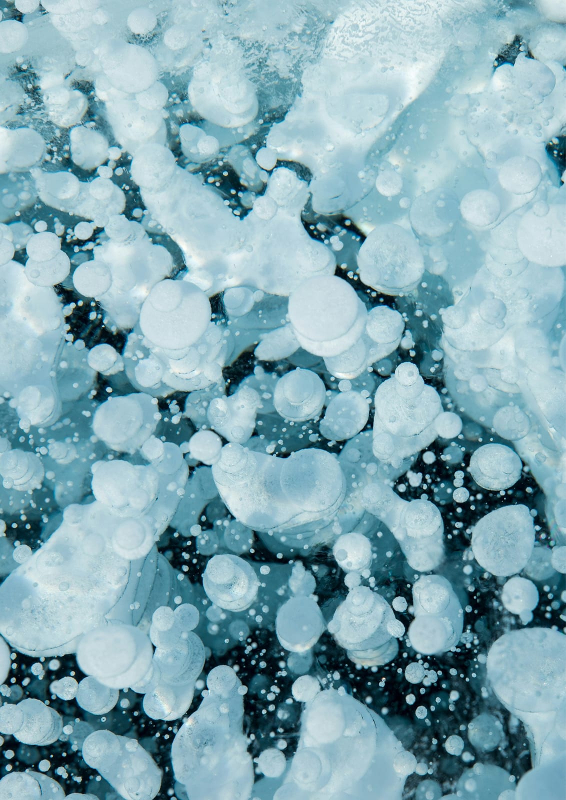 Rounded ice formations appear in blue and white tones.
