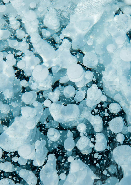 Rounded ice formations appear in blue and white tones.