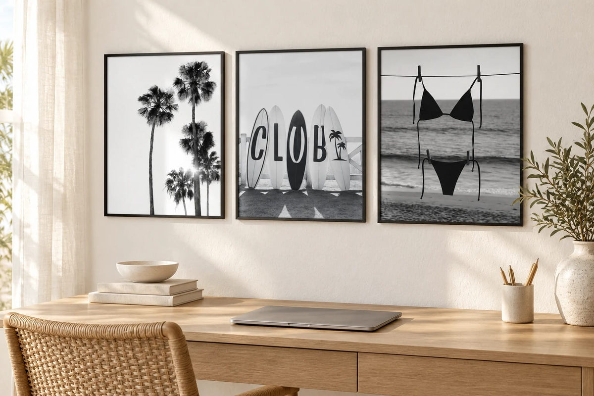 Three black-and-white coastal prints grouped on a wall; frames are not included.