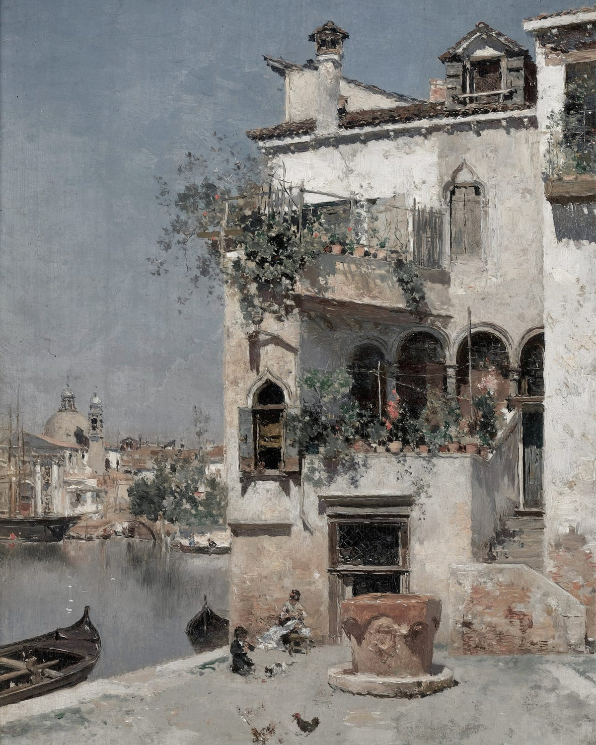 A house with balconies facing a canal.