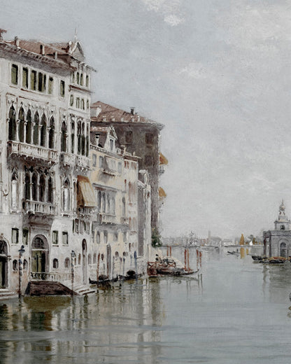 Building facades lining a broad canal.
