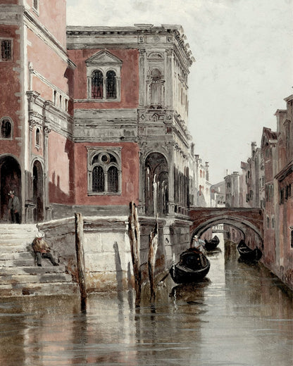 A reddish facade and bridge above a canal.