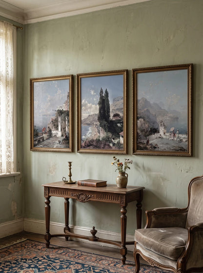 Three coastal prints displayed on a muted green wall.