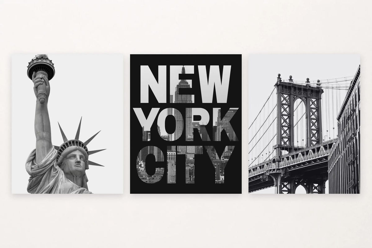 Three black-and-white city prints show the Statue of Liberty, NEW YORK CITY lettering, and a suspension bridge.