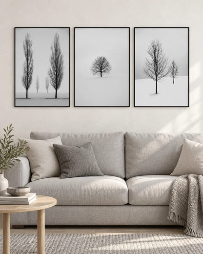 Three snowy tree prints arranged together in a room view; frames are not included.