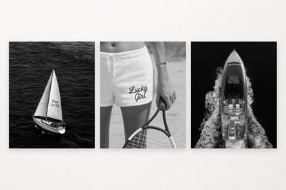 Three leisure prints show a sailboat, Lucky Girl shorts with a tennis racket, and a motorboat wake.