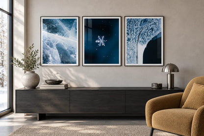Blue and white winter prints grouped near a fireplace.