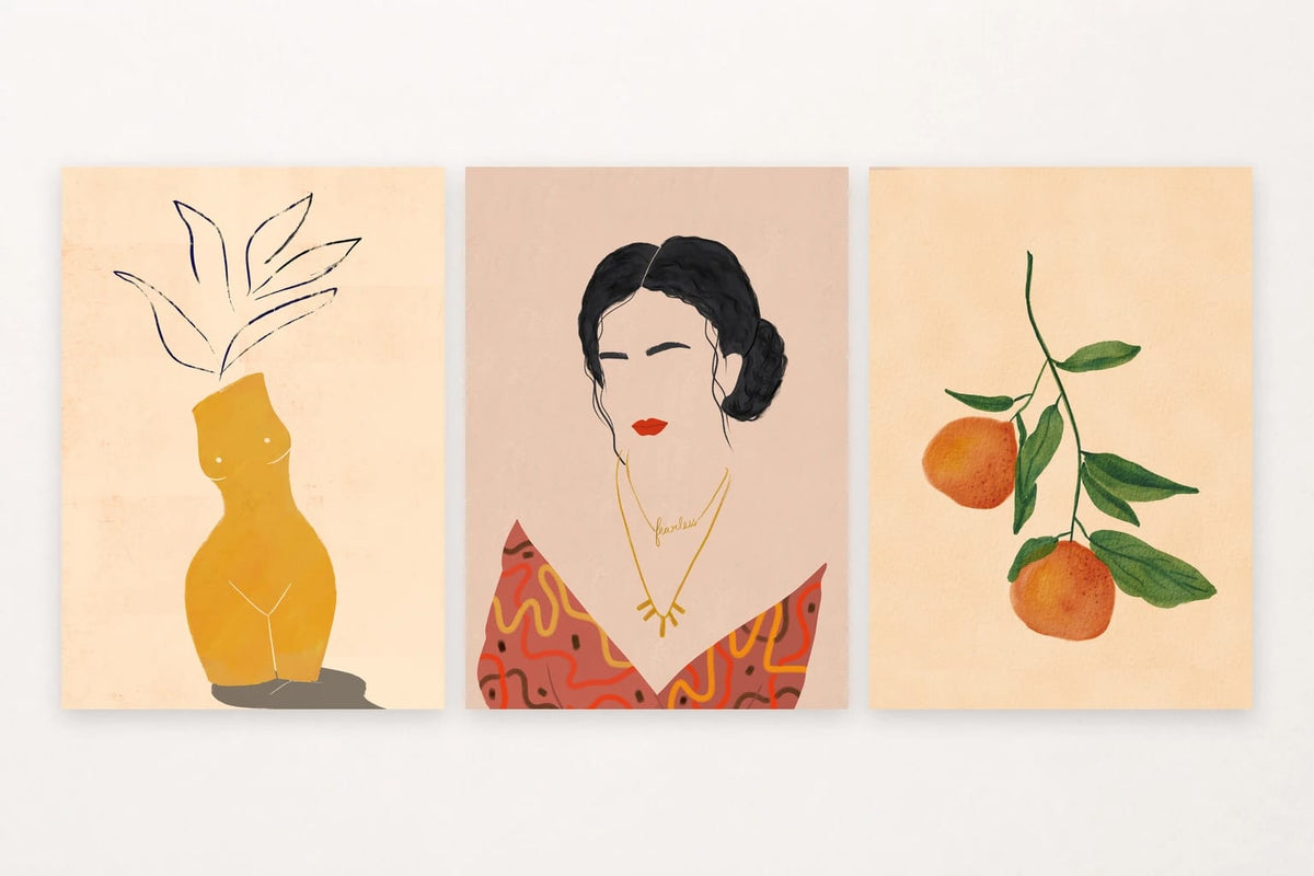 Three prints show an ochre vase, a woman's portrait, and oranges on a green branch.