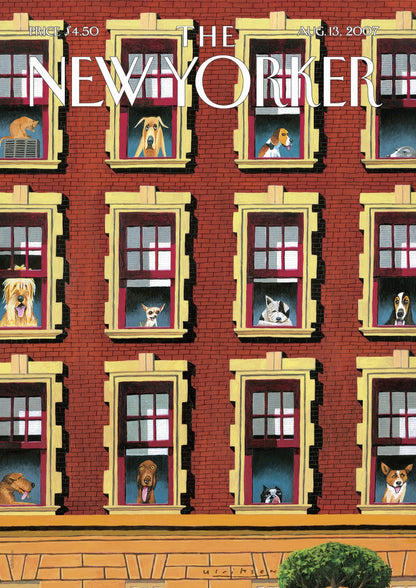 Dogs look from windows in a red-brick building.