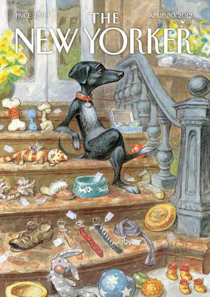 A black dog sits among toys and pet supplies.