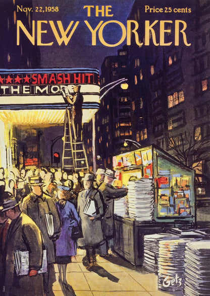 A nighttime crowd gathers near an illuminated theater and kiosk.