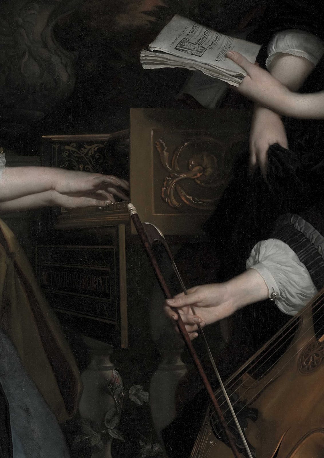 Hands and a sheet of paper frame a stringed instrument.