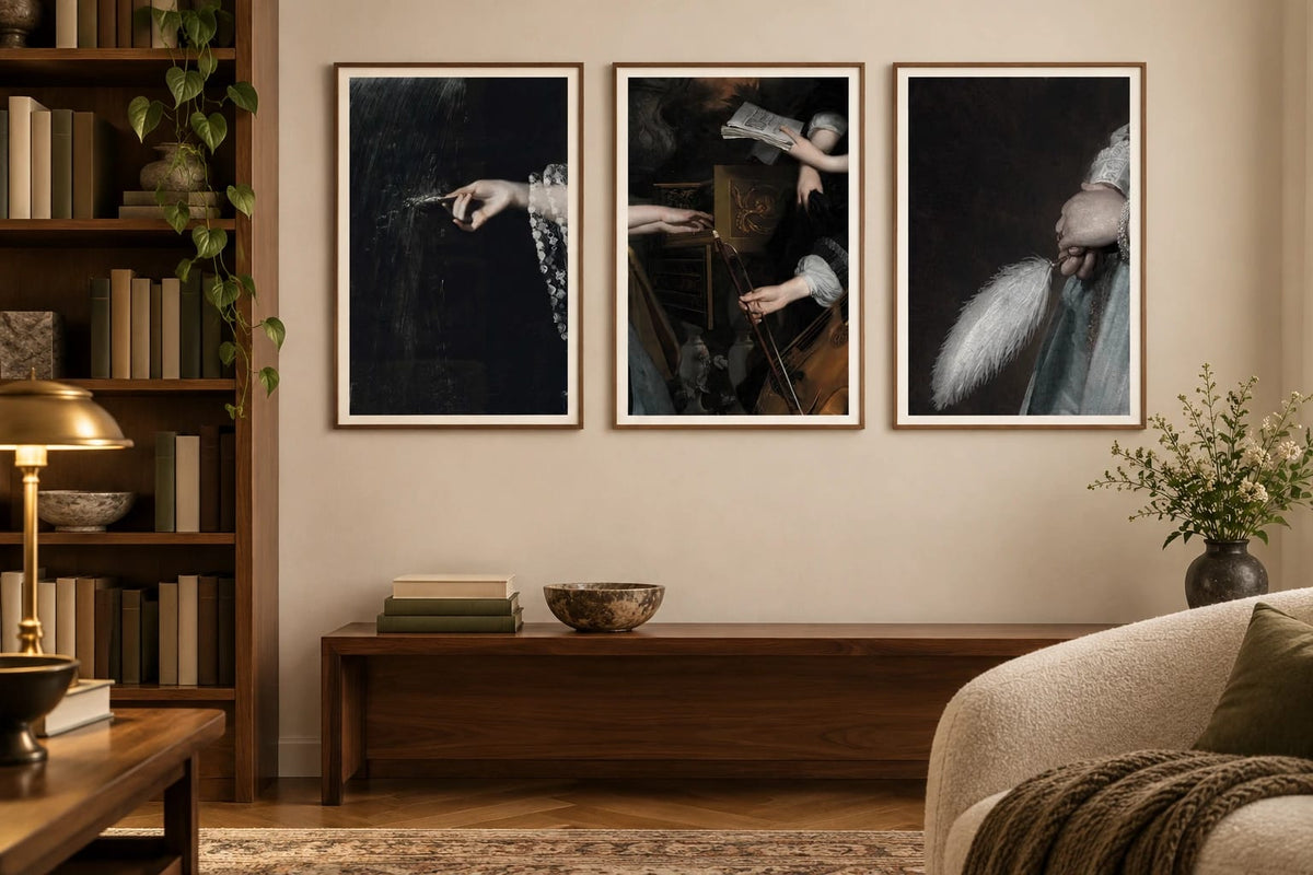 Three art-study prints displayed in a light library area.