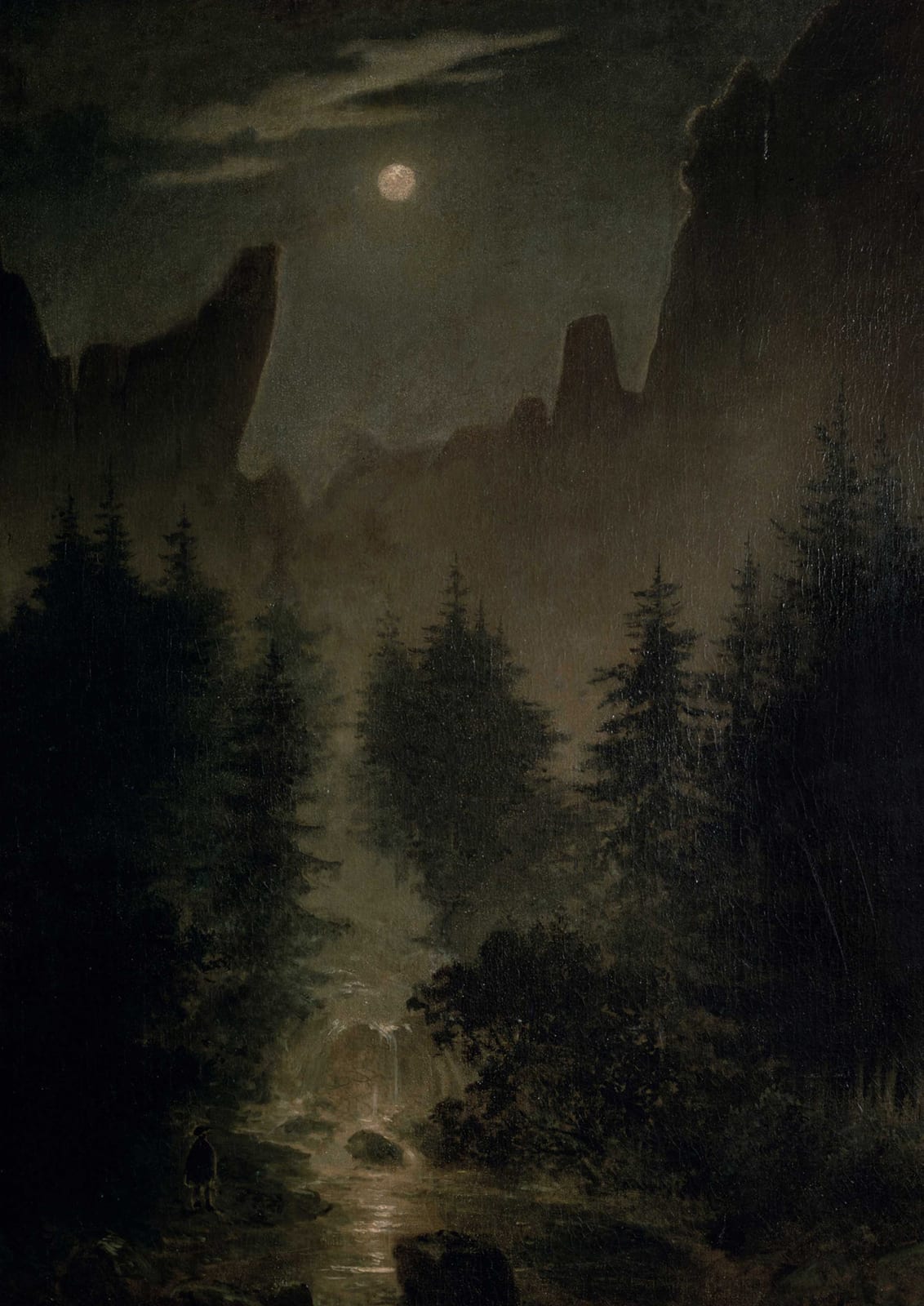A forest valley sits beneath the moon.