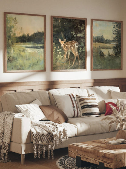 A lakeside, spotted deer, and open lake view grouped in a room; frames are not included.