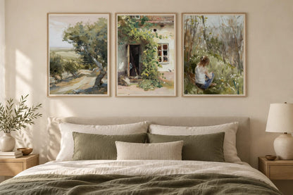 Garden prints above a bed with linen textiles.