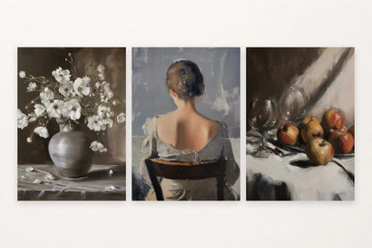 Three still-life and figure prints show white flowers, a seated woman, and apples with dark glassware.