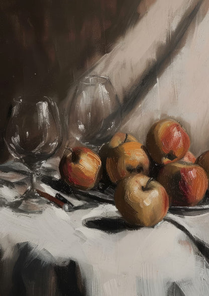 Red and yellow apples beside dark glassware on a pale cloth.