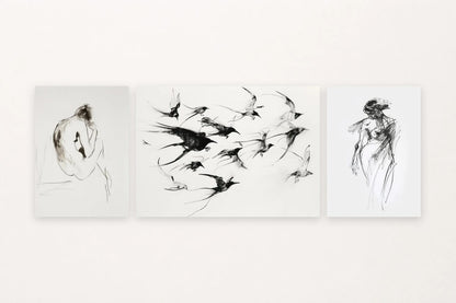 Three minimalist prints: a seated figure, birds in flight, and a standing figure.