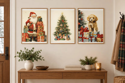 Holiday prints displayed above a console in a light entryway.